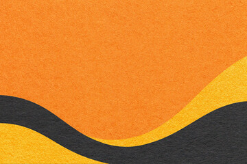 Textured warm orange paper background with black and yellow wavy lines and waves, copy space for banner, presentation