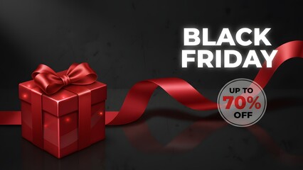 A red gift box with a ribbon on a black Friday sale background
