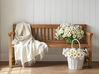 A wooden bench with a white blanket draped over it