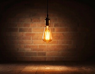 Glowing light bulb hanging in dark room emitting warm orange illumination