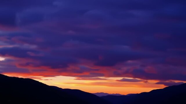 Dramatic sunset sky above mountains scenic landscape natural beauty