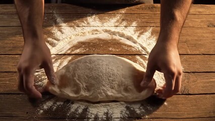 Dough Shaping: Hands Crafting Bread on Wooden Surface