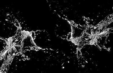 Dynamic water splash against a dark background, capturing the essence of movement and freshness. The image showcases the beauty and energy of water in a moment of action