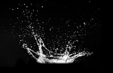 A stunning view of water splash on black background