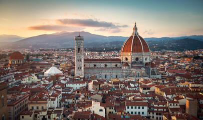 Fototapeta premium Panoramic view of Florence sunset city skyline with Cathedral and bell tower Duomo and Palazzo del Bargello. Florence, Italy.