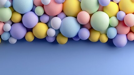 Colorful textured spheres arranged on blue background with copy space for creative designs.

