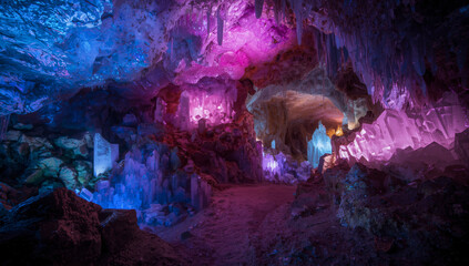 Surreal fantasy cave filled with an array of vibrant magical colored crystals