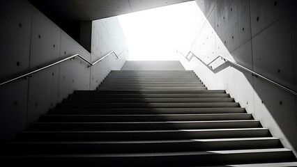 Fototapeta premium Modern Concrete Staircase Leading Towards Bright White Light for Concept of Success or Afterlife