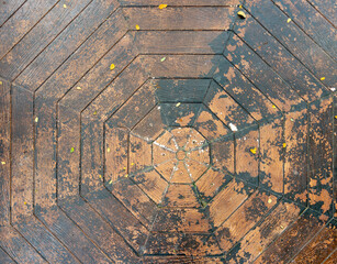 Geometric Octagon Wooden Bench Pattern in Public Park.