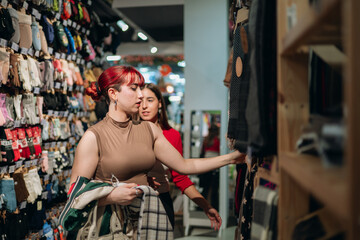 Young women shopping for clothing and accessories