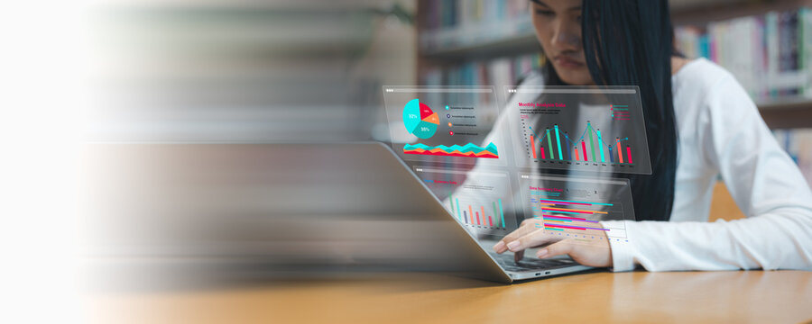 Business woman using laptop with virtual data analysis dashboard. Concept of financial marketing strategy, big data processing and business growth visualization on wooden table. - Powered by Adobe