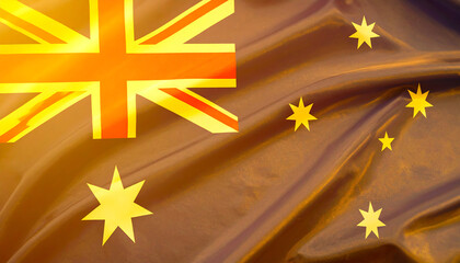 Australian flag waving in the wind with stars and Union Jack emblem visible
