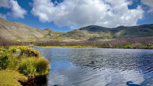 Silvermine dam and mountains. Silvermine park is part of the table mountain national park in Cape Town and offers swimming at the dam and hiking all around with scenic views. 