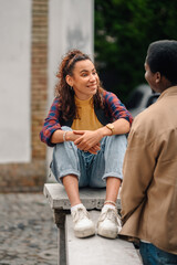 Students relaxing and chatting during break time on campus
