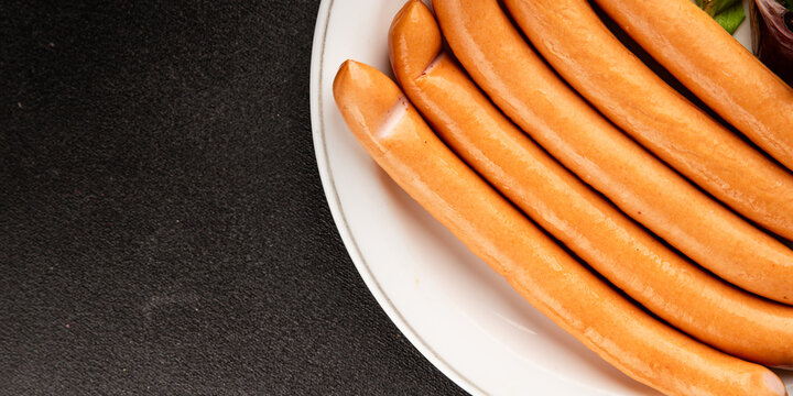 Sausages poultry meat chicken or turkey tasty snack fresh delicious gourmet food background on the table rustic food top view copy space