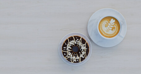 Top View Donut And Coffee On Light Table