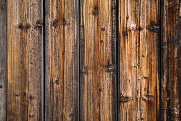 Weathered vertical wooden planks with rustic texture