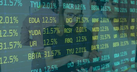 Analyzing five colleagues in shirts poring over tablet in office, showing stylus, glasses, tickers