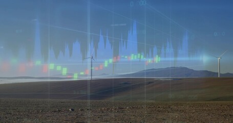 Showing two wind turbines rising over rocky foreground at wind farm, with financial chart overlay
