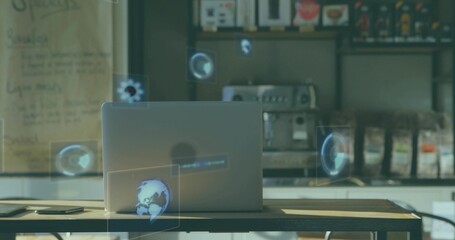 Displaying silver laptop projecting AR icons above wooden table, two flat devices, espresso machine