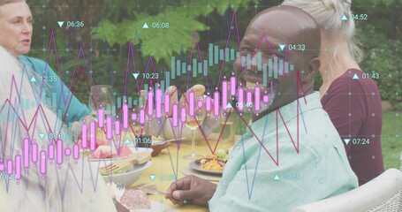 Holding roll, senior wearing green shirt facing camera at yard table with market charts, copy space