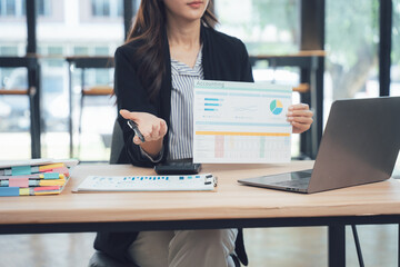 Business Presentation: A confident professional delivers a compelling presentation, effortlessly explaining intricate data charts and spreadsheets to an audience, showcasing a blend of expertise.