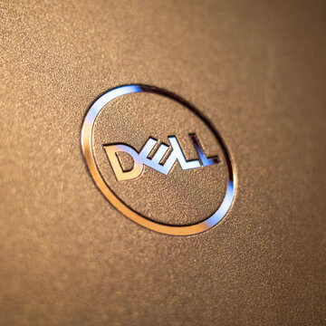Dell Logo Closeup On Laptop Casing Reflective Light