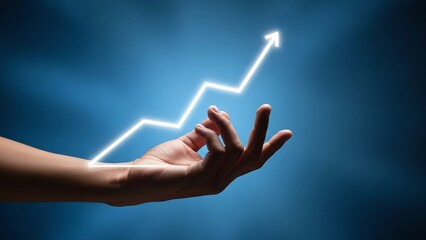 Human hand holding a glowing white upward trend line graph symbolizing growth and success.