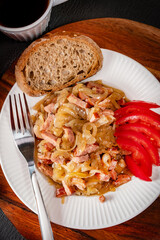 Stewed onion with sausage.