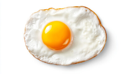 Cooking a fried egg on a white plate. A fried egg with a bright yellow yolk sits on a white plate ready to be served for breakfast or brunch.