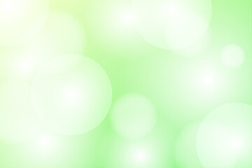 光と丸いぼかしが重なる淡い緑の幻想的な抽象背景イラスト