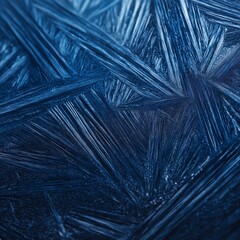 Obraz premium Frosty ice crystal patterns forming on blue glass. Blue frosty ice forming sharp, sparkling crystal patterns on a cold surface