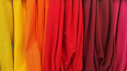 Sample of dress textile various colors catalog and swatch of fabric. Collection of multicolored cloth.