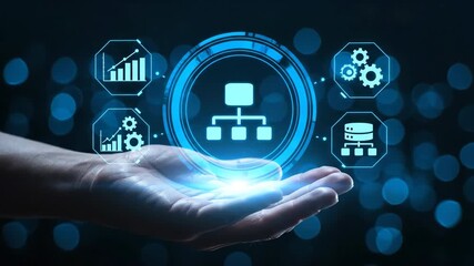 Human hand displays a glowing blue digital network flowchart with business icons against a dark bokeh background. - Powered by Adobe