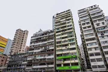 Kowloon, Hong Kong, China : aging residential apartment buildings illustrating urban density and high-rise housing in the city