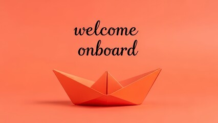 A vibrant orange origami boat with a welcome onboard message on a solid background