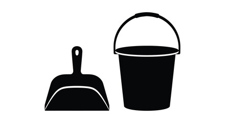 An isolated depiction of a black bucket and shovel presented as a striking silhouette © MIRAJ02