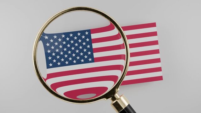 magnifying glass hovering over usa flag, grey background