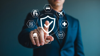 Persons hand touching a digital shield icon surrounded by various insurance policy icons representing different aspects of protection and security services