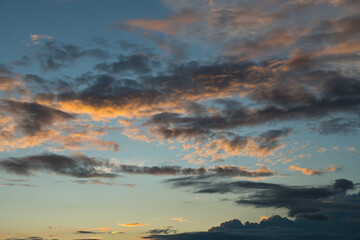 Black and yellow clouds. Beautiful sunset sky