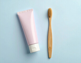 Oral hygiene. Minimalistic bamboo toothbrush with a tube of natural toothpaste on a white background. Health care.