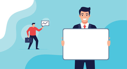 Smiling businessman in a dark suit holds a large blank white board for custom text while another person presents a graph in the back.