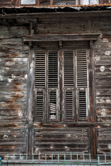 Abandoned weathered building reflects historic decline