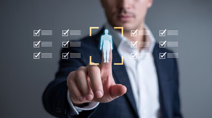 Businessmans hand interacting with a holographic interface showing a person icon and multiple checkmarks for selection purposes