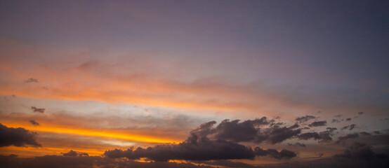 Fototapeta premium Sunset background. Beautiful sky with colorful clouds.