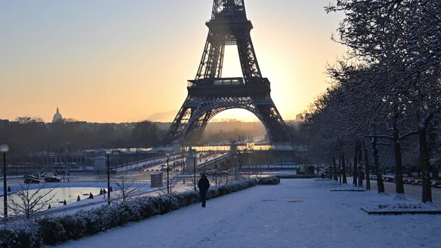 Eiffel Tower at sunrise in winter with snow, Paris