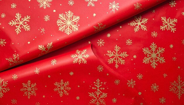 Red wrapping paper rolls with gold snowflake patterns&mdash;festive, elegant design ideal for holiday packaging, gift wrapping, and seasonal decoration with vibrant contrast and metallic charm.