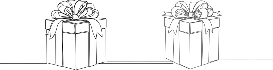 Two beautifully wrapped gift boxes with ribbon bows, perfect for celebrations and special occasions