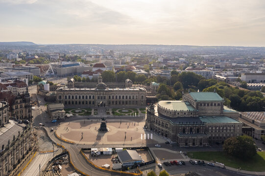 Aerial view of Zwinger Palace's baroque architecture and Semper Opera House's grandeur meet in Dresden's heart, framed by the city's expansive skyline., Dresden, Saxony, Germany.