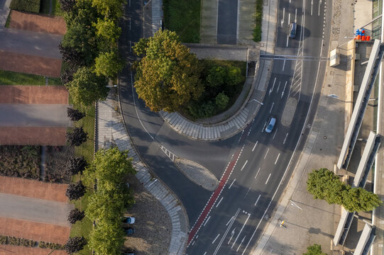 Aerial view of roads intertwining with lush greenery and modern architecture creates a beautiful contrast, Dresden, Saxony, Germany.